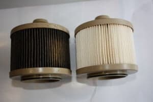 Diesel fuel filter comparison, clean versus contaminated - Trusted Mechanical, Adelaide