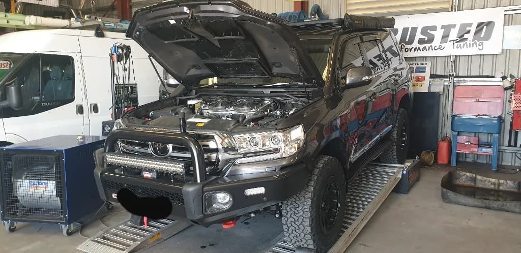 Toyota 200 Series diesel with bonnet up on the dyno during an ECU remap at Trusted Mechanical, Adelaide