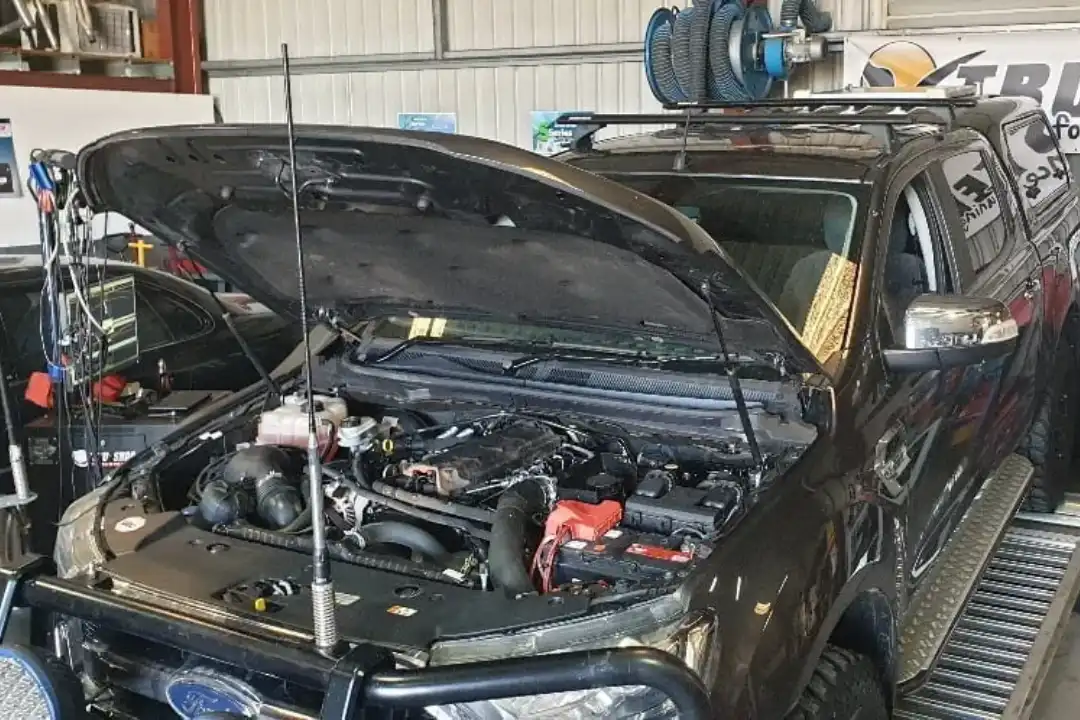 Mechanic servicing a vehicle for a Hallett Cove customer at Trusted Mechanical, Lonsdale