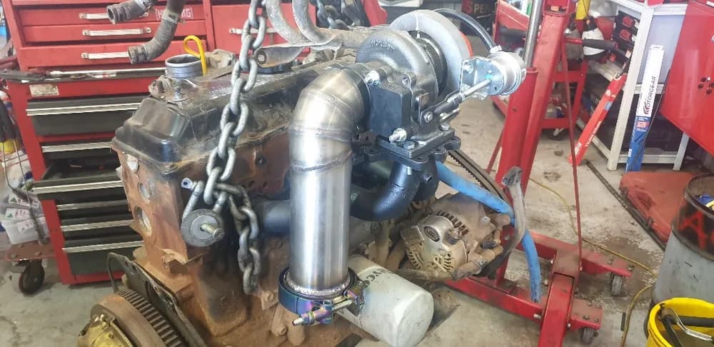Toyota Hilux diesel engine with upgraded turbo during a workshop build at Trusted Mechanical, Adelaide